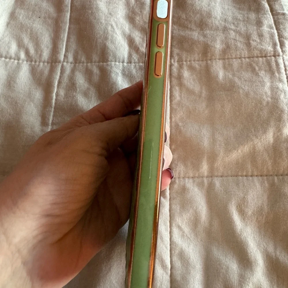 Iphone 11 pro max green quilt like phone with gold trim